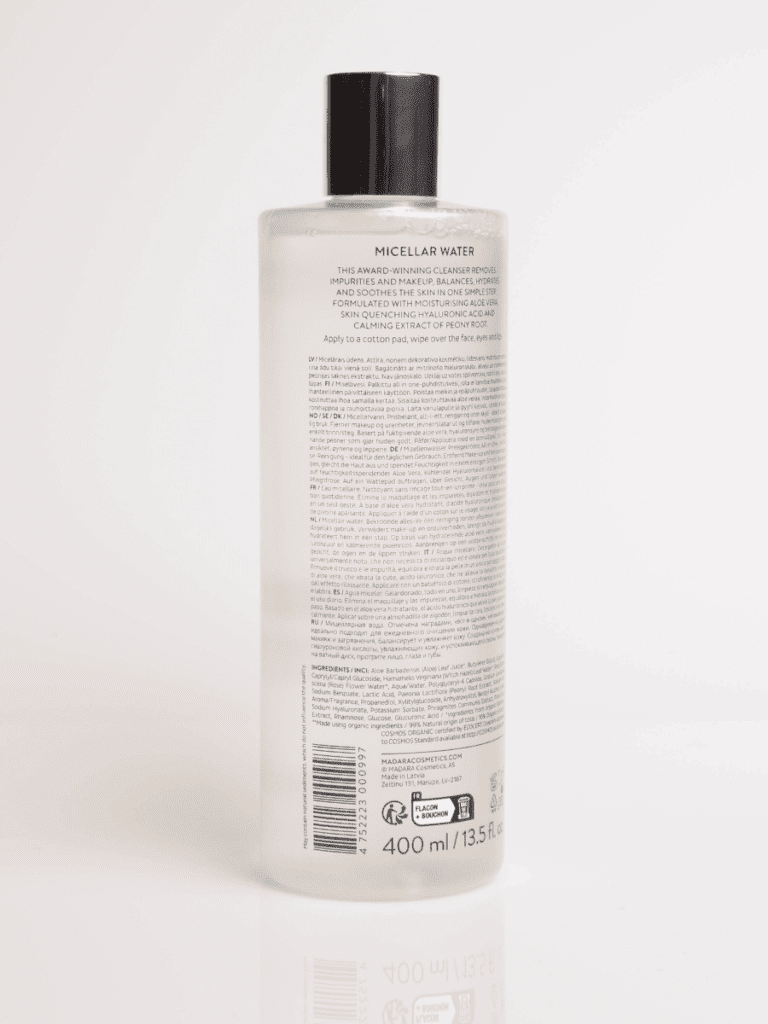 Gennemsigtig 400 ml micellar water-flaske med sort låg og tekstfyldt bagetiket