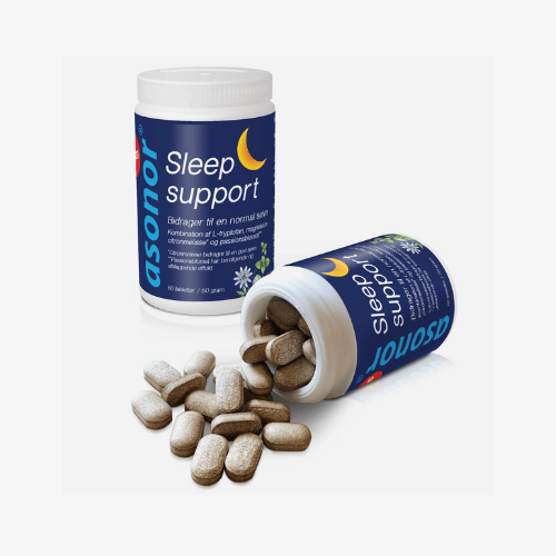 Asonor Sleep Support-kosttilskud, to beholdere hvor den ene ligger på siden og spilder brune tabletter