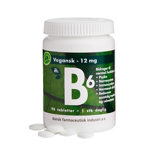 Hvid flaske med vegansk B6 12 mg kosttilskud, grøn etiket, 90 tabletter og enkelte piller foran