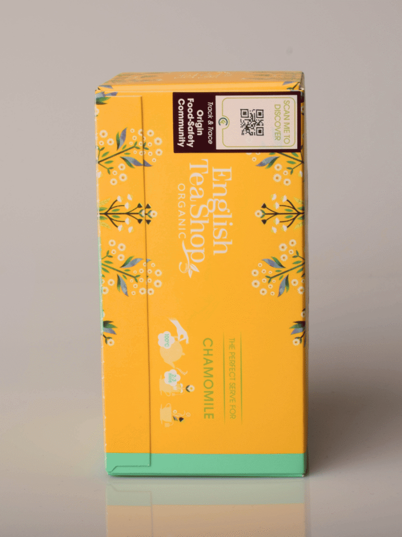 English Tea Shop økologisk kamillete i gul og grøn æske med små hvide blomstermotiver
